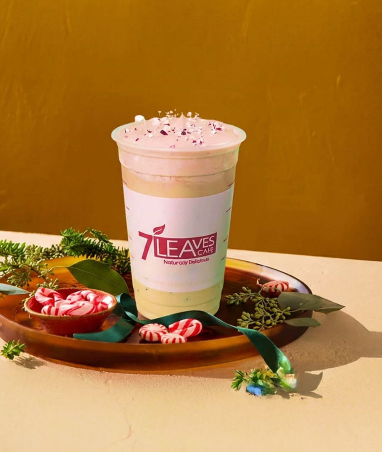 Win a Free Holiday House Coffee with $5 Purchase at 7 Leaves Café